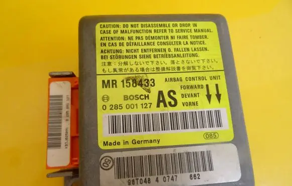 Mitsubishi Carisma Airbag control unit/module 0285001127