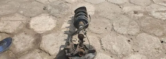 Front wheel hub spindle knuckle