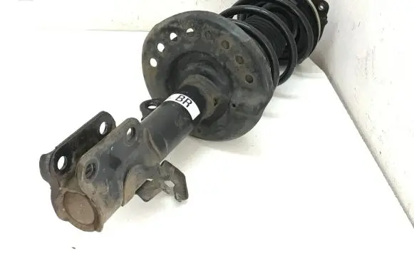 Nissan Pulsar Front shock absorber with coil spring 543023ZL0C 543201KA0B