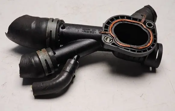 Volkswagen Polo V 6R Engine coolant pipe/hose 03L121131AA
