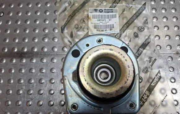 Coil spring mount