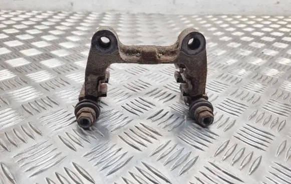 Volkswagen PASSAT B6 Brake caliper pad carrier rear 