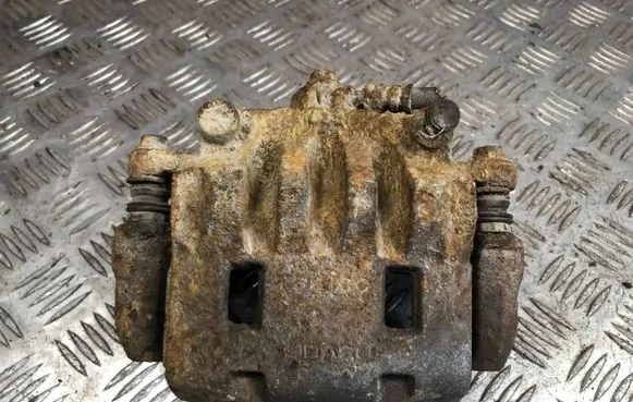 Subaru Impreza II Front brake caliper