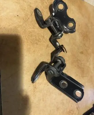 Rear door upper hinge
