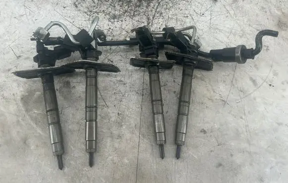 Volkswagen PASSAT B7 Fuel injectors set 0445116030 03L130277