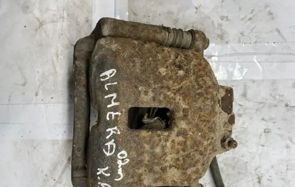 Nissan Almera N16 Front brake caliper