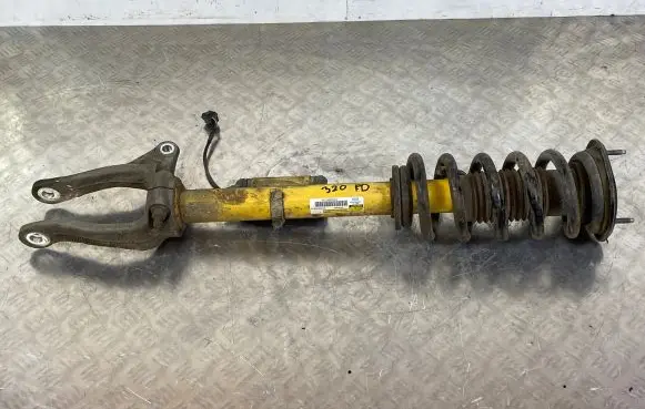 Jeep Grand Cherokee Front shock absorber with coil spring 68256888AA