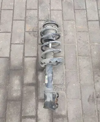 Front shock absorber with coil spring