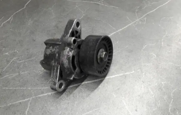 Renault Megane I Timing belt tensioner 7700102872