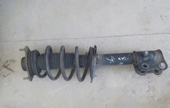 Hyundai Santa Fe Front shock absorber with coil spring 9878999
