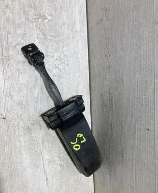 Front door check strap stopper