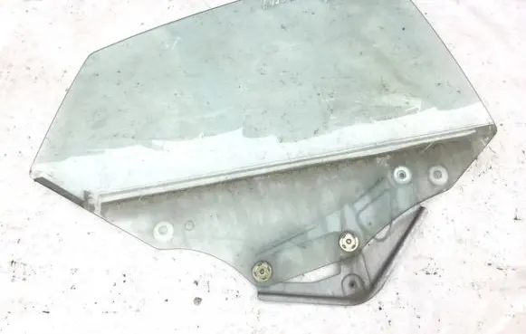 Mazda 323 F Rear door window glass 