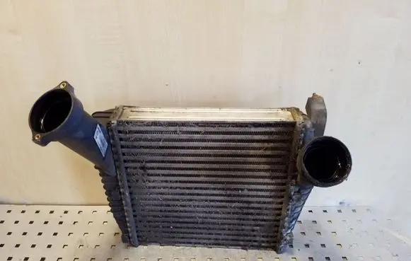 Volkswagen Touareg I Intercooler radiator 7L6145803C