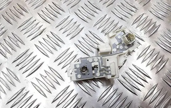 Tail light bulb cover holder