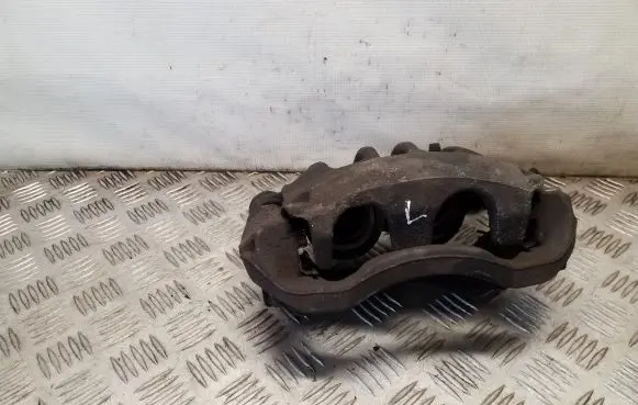 Opel Movano B Front brake caliper 410105039R