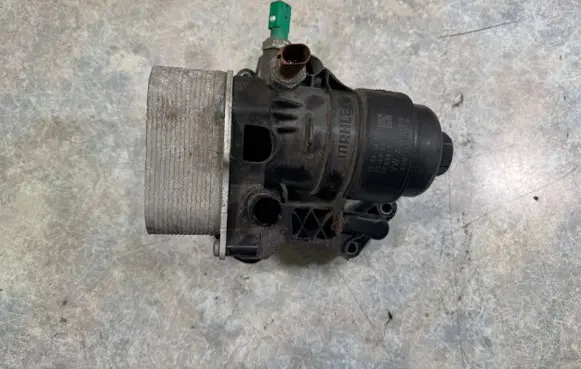 Volkswagen Beetle A5 Oil filter mounting bracket 03N117021