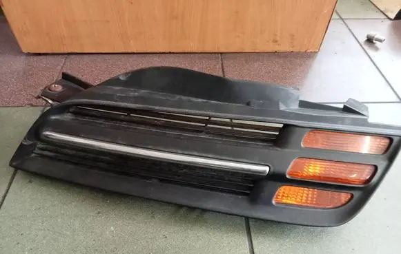 Nissan Micra Front bumper lower grill 62330AX600