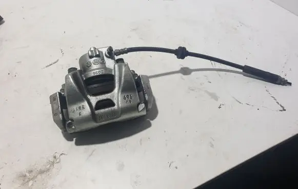 Fiat 500L Front brake caliper 00520289620