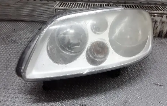 Volkswagen Touran I Headlight/headlamp 1T0941005D