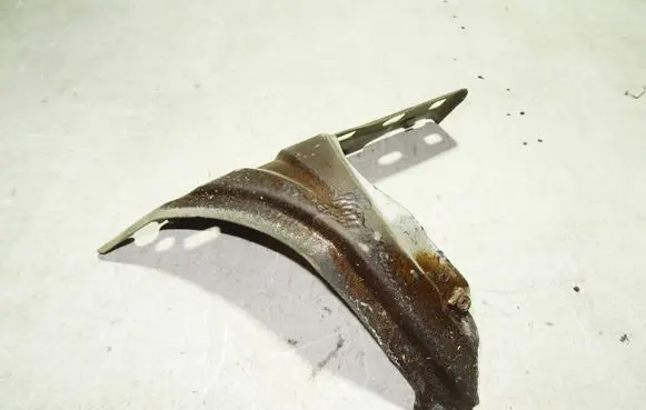 Volkswagen Caddy Fender mounting bracket 1T0821136