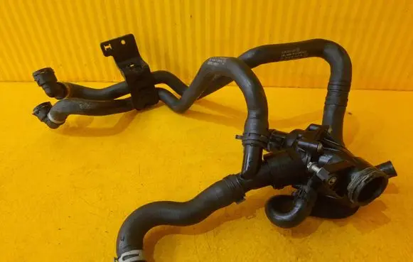 Thermostat/thermostat housing