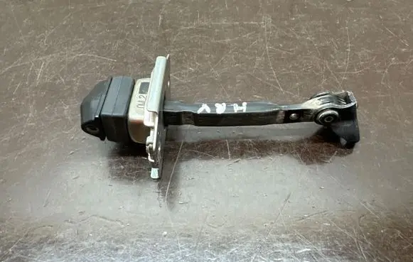 Rear door check strap stopper