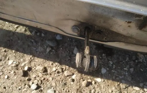 Rear door check strap stopper
