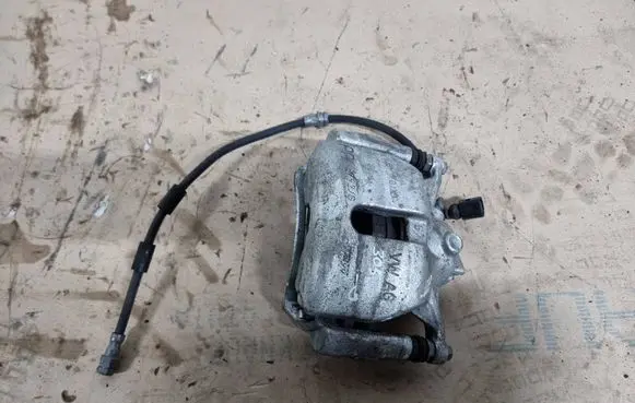 Volkswagen Golf VII Front brake caliper 5Q0106DM