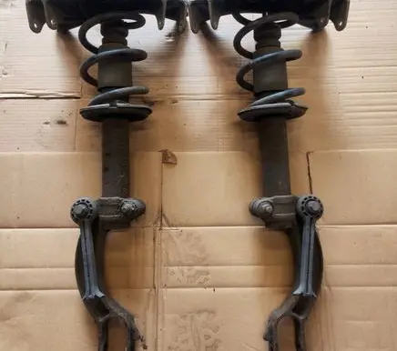Audi A5 8T 8F Front shock absorber with coil spring 8F0031M