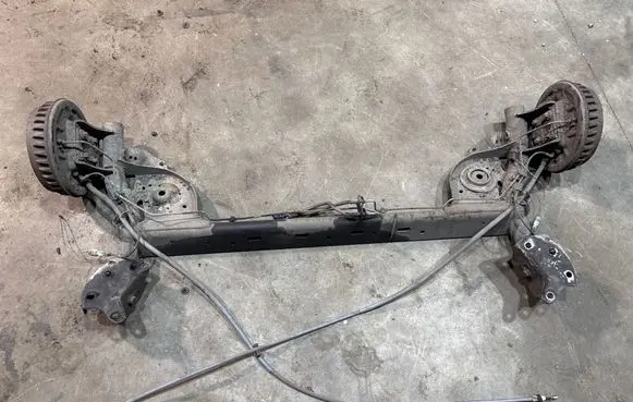 Dacia Logan II Rear axle beam 555114695R 555011165R