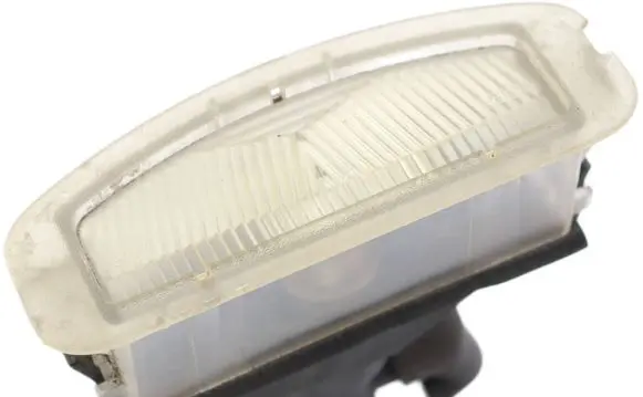 Nissan Micra Number plate light 23697800