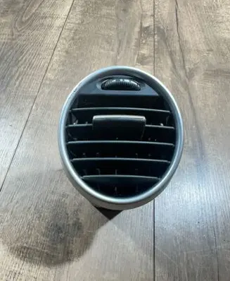 Dash center air vent grill