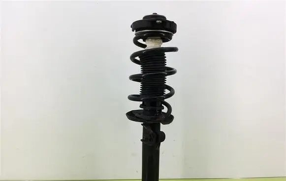 Volkswagen Touran I Front shock absorber with coil spring A36050