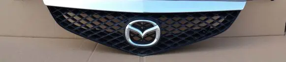 Mazda Premacy Front bumper upper radiator grill