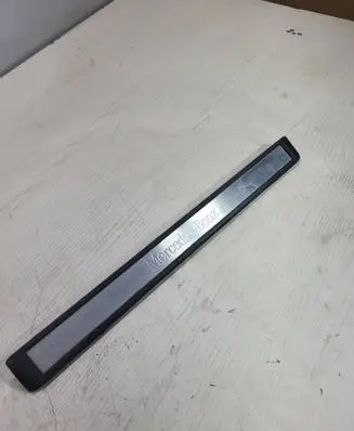 Front sill trim cover