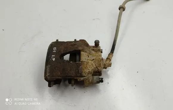 Volkswagen Golf IV Front brake caliper