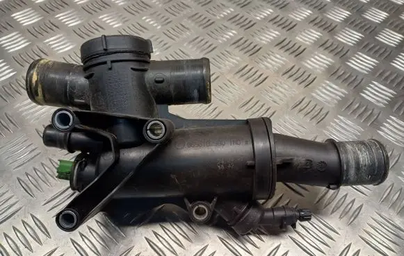 Thermostat/thermostat housing
