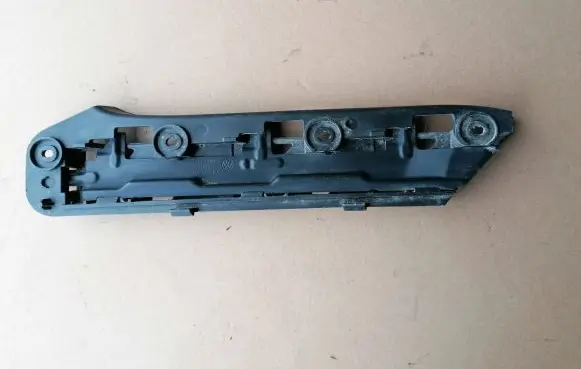 Volkswagen Touran I Front bumper mounting bracket 1T0807936
