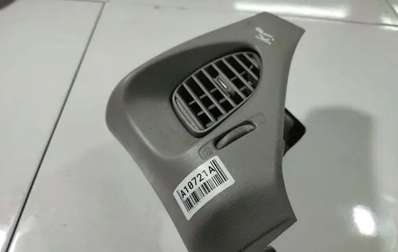 Nissan Almera Tino Dash center air vent grill 68210K10281