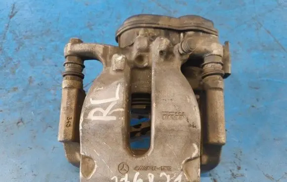 Mercedes-Benz GL X166 Front brake caliper A1664230381
