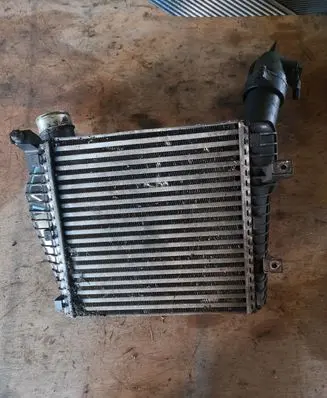 Volkswagen Touareg I Intercooler radiator