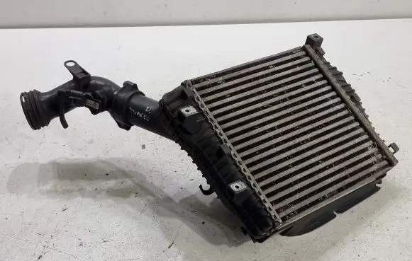 Volkswagen Touareg I Intercooler radiator 7L0145804A