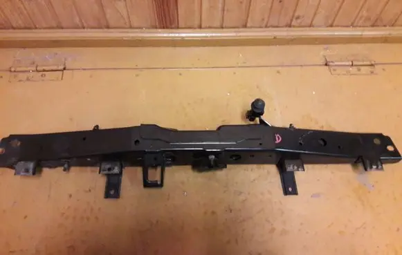 Top upper radiator support slam panel