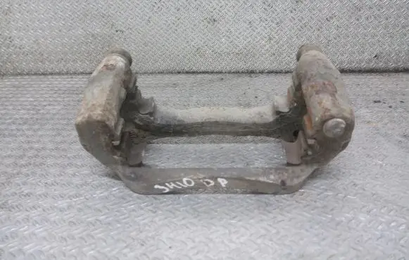 Mazda CX-7 Front Brake Caliper Pad/Carrier 