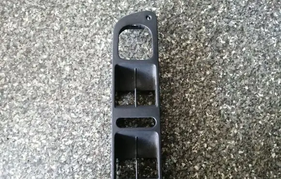 Volkswagen Tiguan Front door window switch trim 5N1867255
