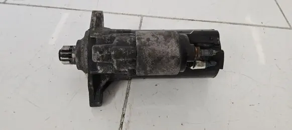 Volkswagen Touran I Starter motor 0001123016 02E911023H