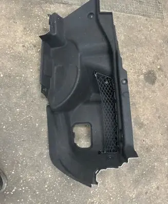Trunk/boot lower side trim panel