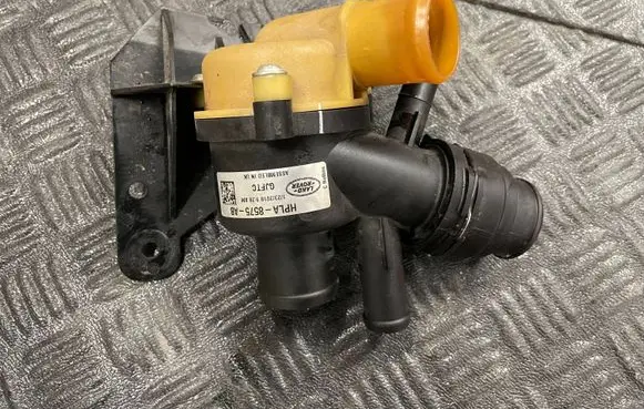 Thermostat/thermostat housing