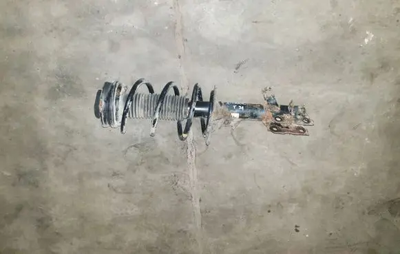 Nissan X-Trail T31 Front shock absorber with coil spring 54302JG72A