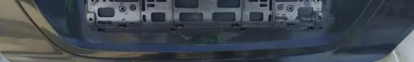 Trunk door license plate light bar